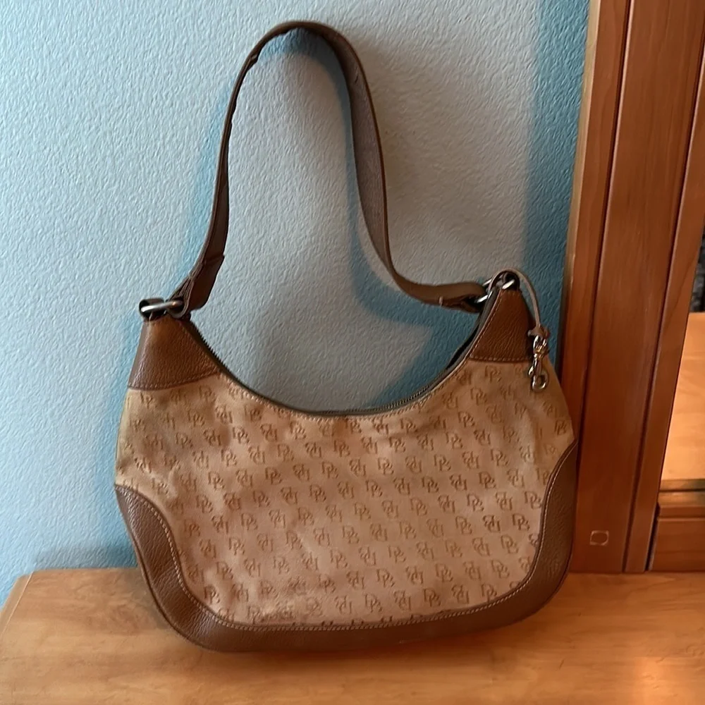 Dooney and Bourke classic monogram canvas and leather Tan color small hobo bag